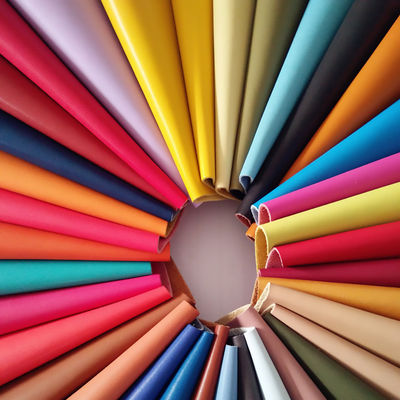 El poliéster laminó la PU impermeable de la microfibra cubrió microfibra hecha girar poliéster reciclada el 100% de la tela cubrió la tela del bolso